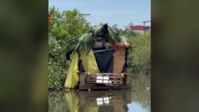 Casa  construda sobre o rio em Balnerio Cambori; VDEO