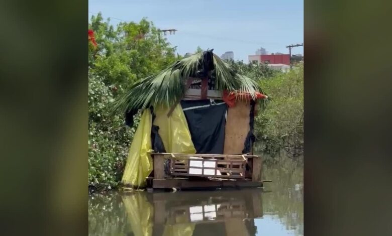 Casa  construda sobre o rio em Balnerio Cambori; VDEO