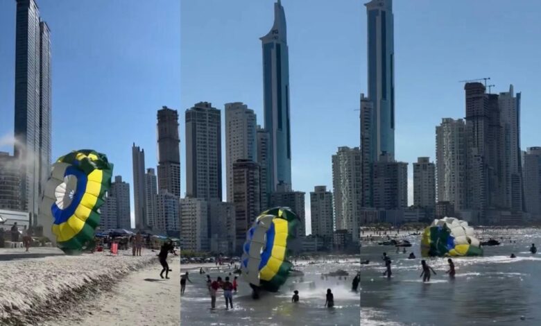 VÍDEO: Paraquedas atropela banhistas em praia de Balneário Camboriú em decolagem